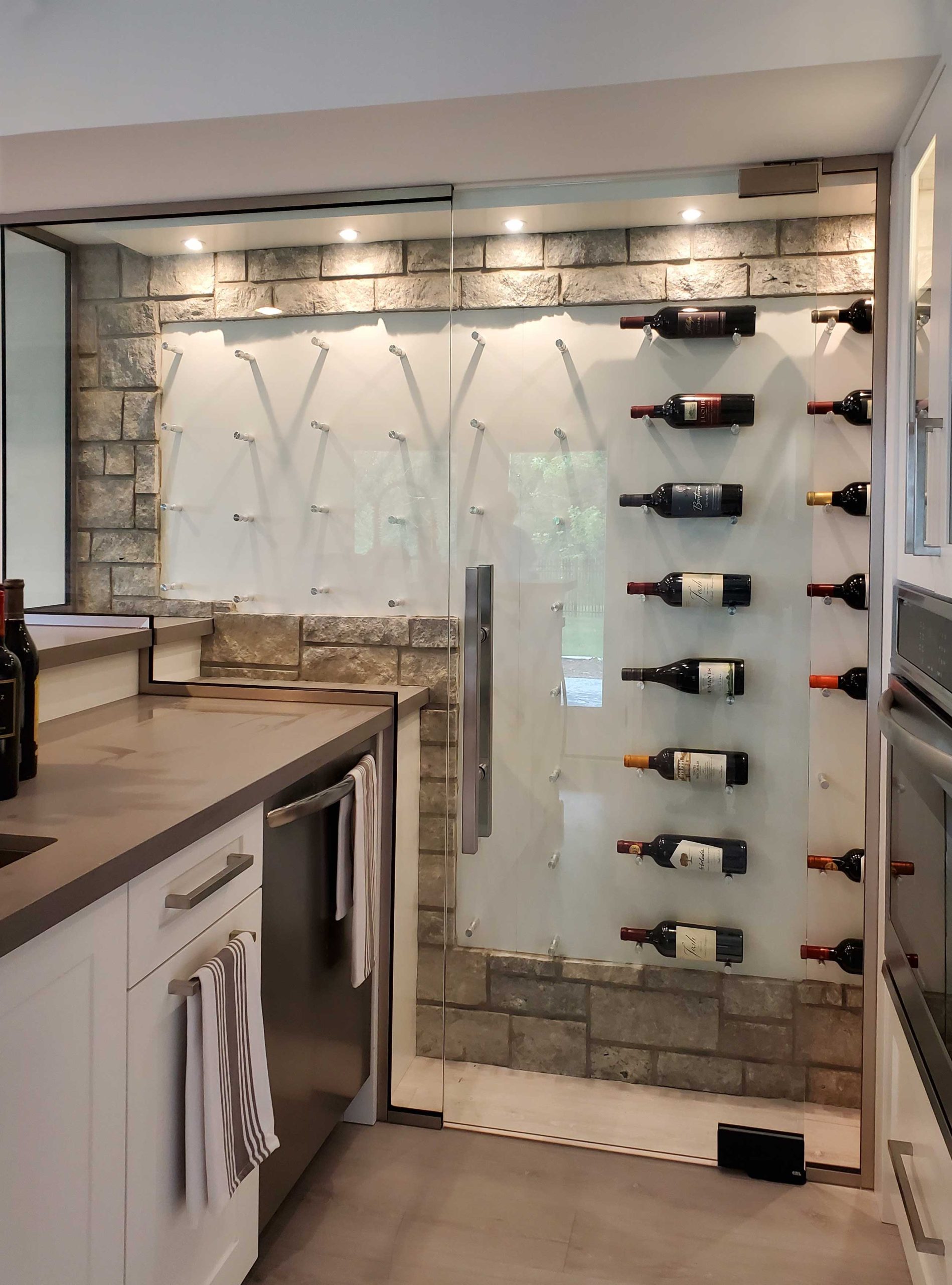 Wine cellar made of glass partitions and walls